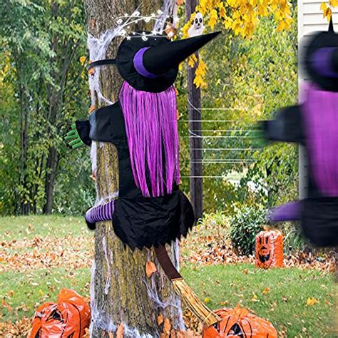 Give Your Christmas Tree a Spooky Twist with a Crashing Witch Decoration